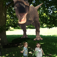 children in park with dinosaur