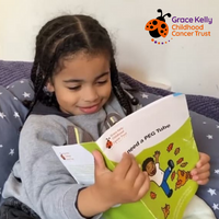 Grace Kelly Trust information - child reading book