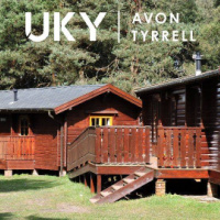 Wooden lodges at Avon Tyrrell