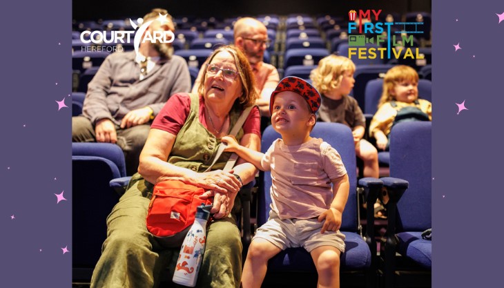 Child Watching Film Looking Excited