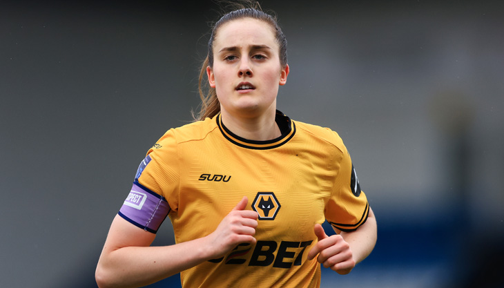 Wolves Women Captain Anna Morphet running in a Wolves Kit