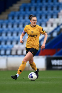 TELFORD, ENGLAND - FEBRUARY 23: Anna Morphet of Wolverhampton Wanderers runs with the ball during the FA WNL Northern Premier Division match between Wolverhampton Wanderers and Stoke City at SEAH Stadium on February 23, 2025 in Telford, England. (Photo by Jess Hornby - WWFC/Wolves via Getty Images)