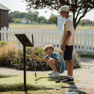 Crazy aadventure golf at the oakwood esher with children playing in the half term holiday activity camps
