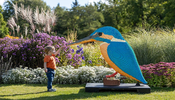 RHS Garden Wisley Summer Brick Explorers With Child Looking At A Huge Lego Bird