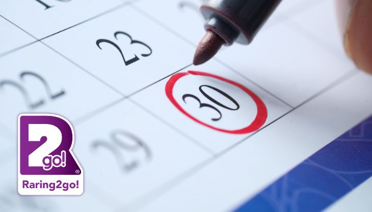 A Calendar With Someone Marking A Date On With A Pen Plus The Raring2go! Logo