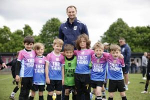 Platform Sports Coaching with children in football kit