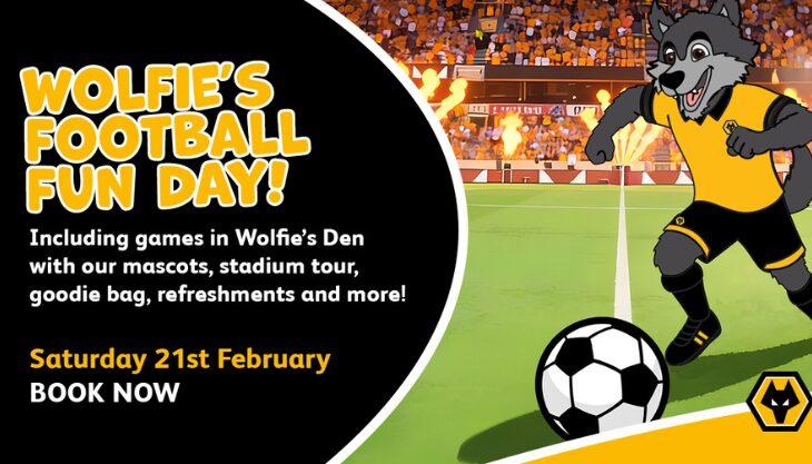 Wolves Football Club's Cartoon Mascot Wolfie Running Across The Pitch.