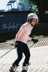 christmass market and ski race day festive family fun at the oakwood esher with girl skiing