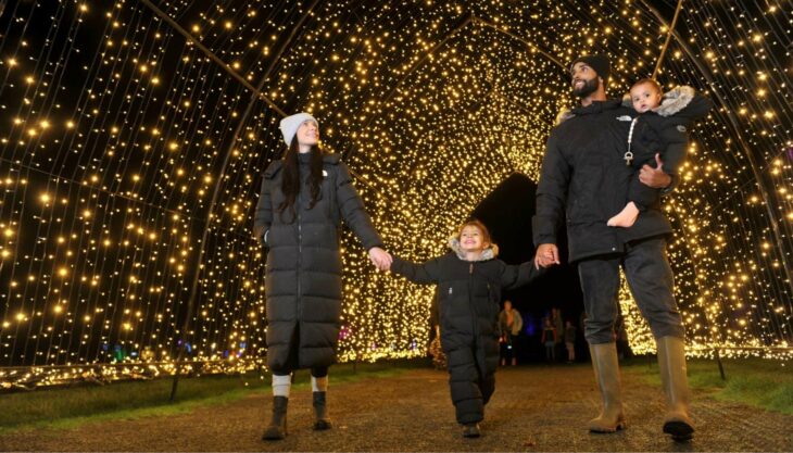 Family Enjoying The Lights At Winter Glow At Three Counties Showground