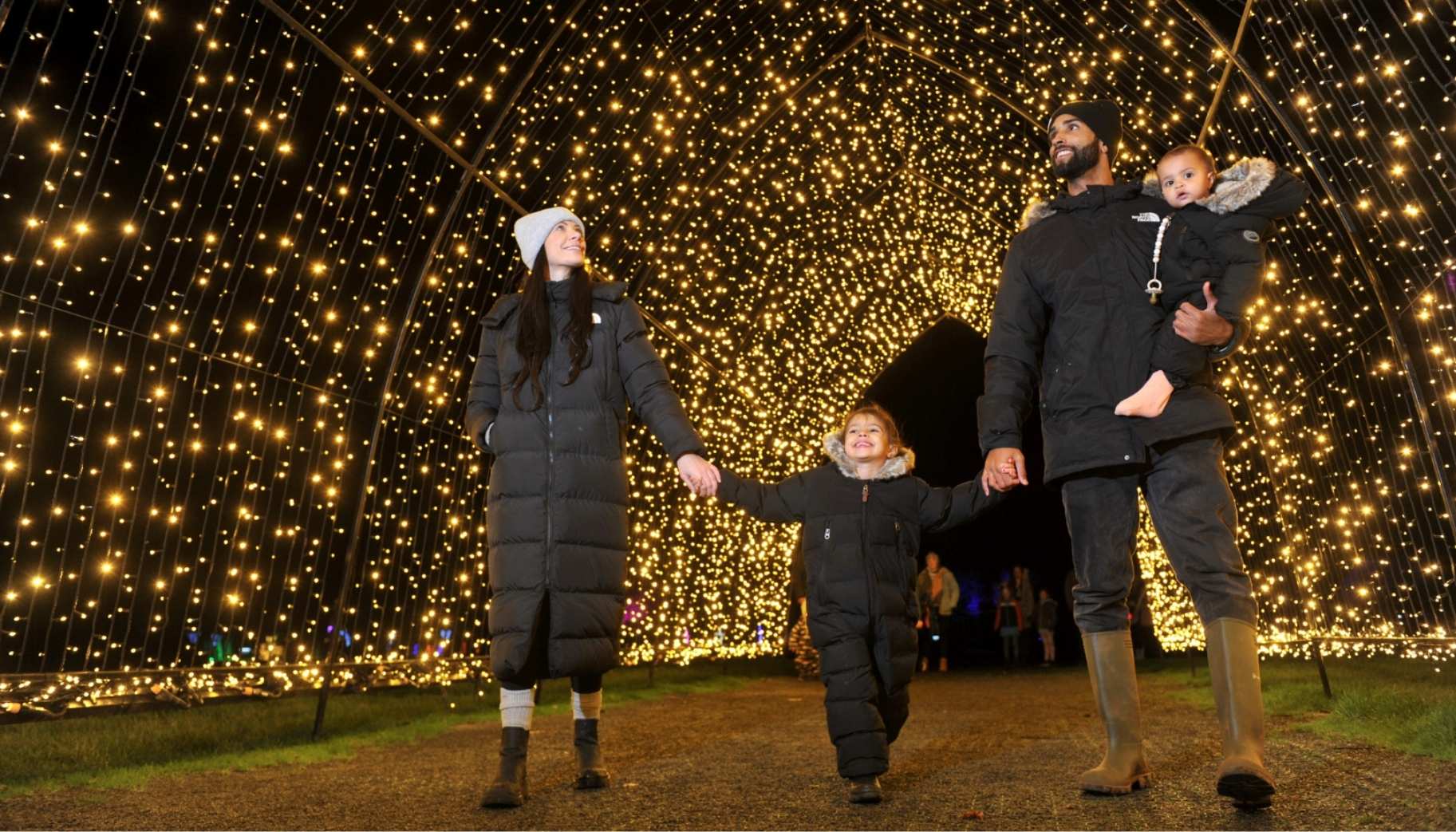 family enjoying the lights at winter glow at three counties showground
