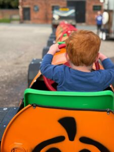 Boy on a train at Wood Hall Farm Wolverhampton PYO