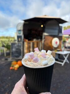 Wood Hall Farm Wolverhampton PYO someone holding up a hot chocolate