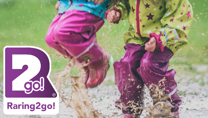Kids Happily Jumping In Muddy Puddles
